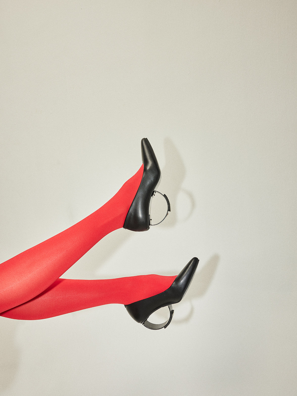 Midnight Black Plant Leather & Steel Crescent Heel Pumps