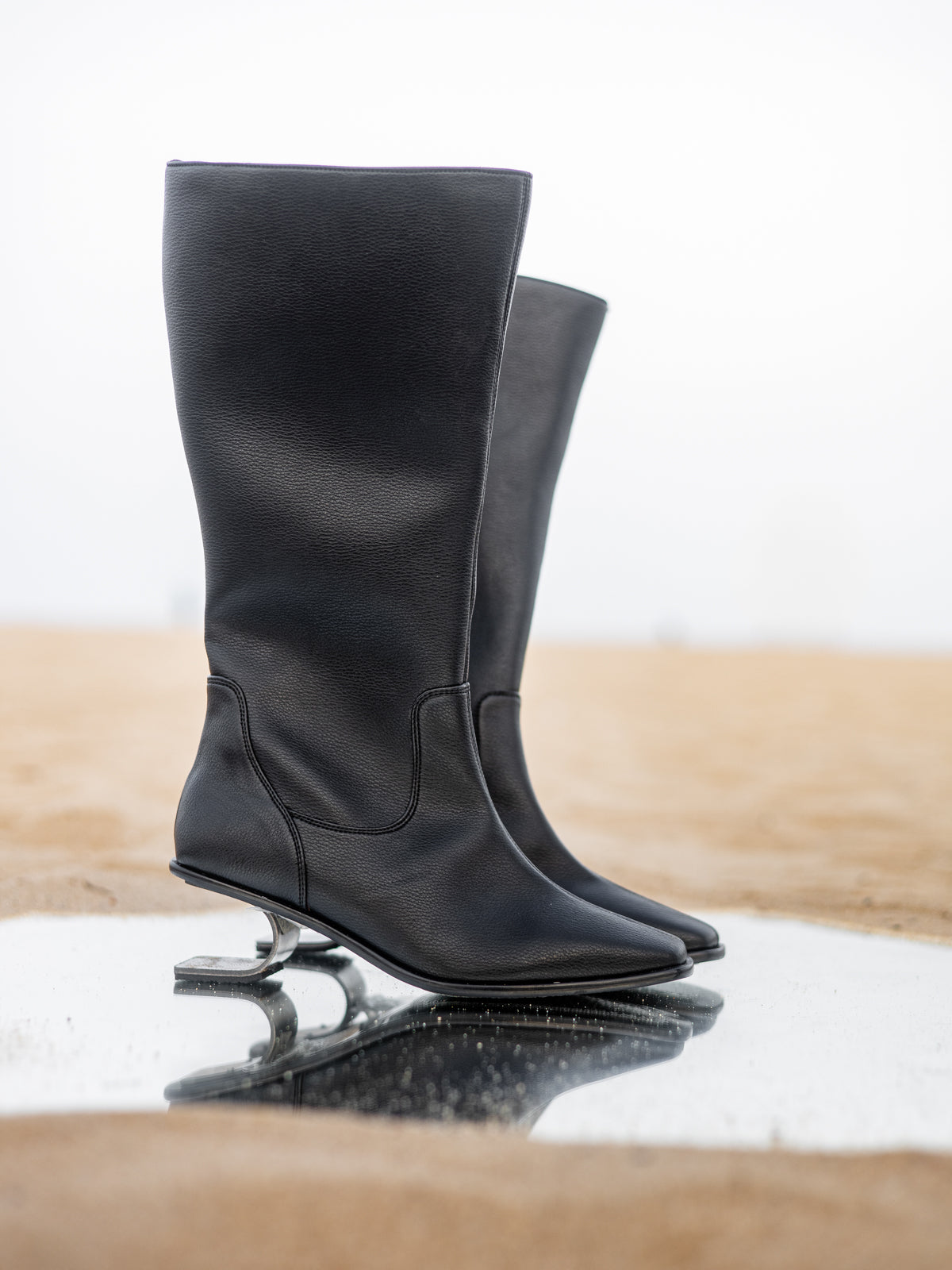 Inky Black Plant Leather and Stainless Steel Knee Boots
