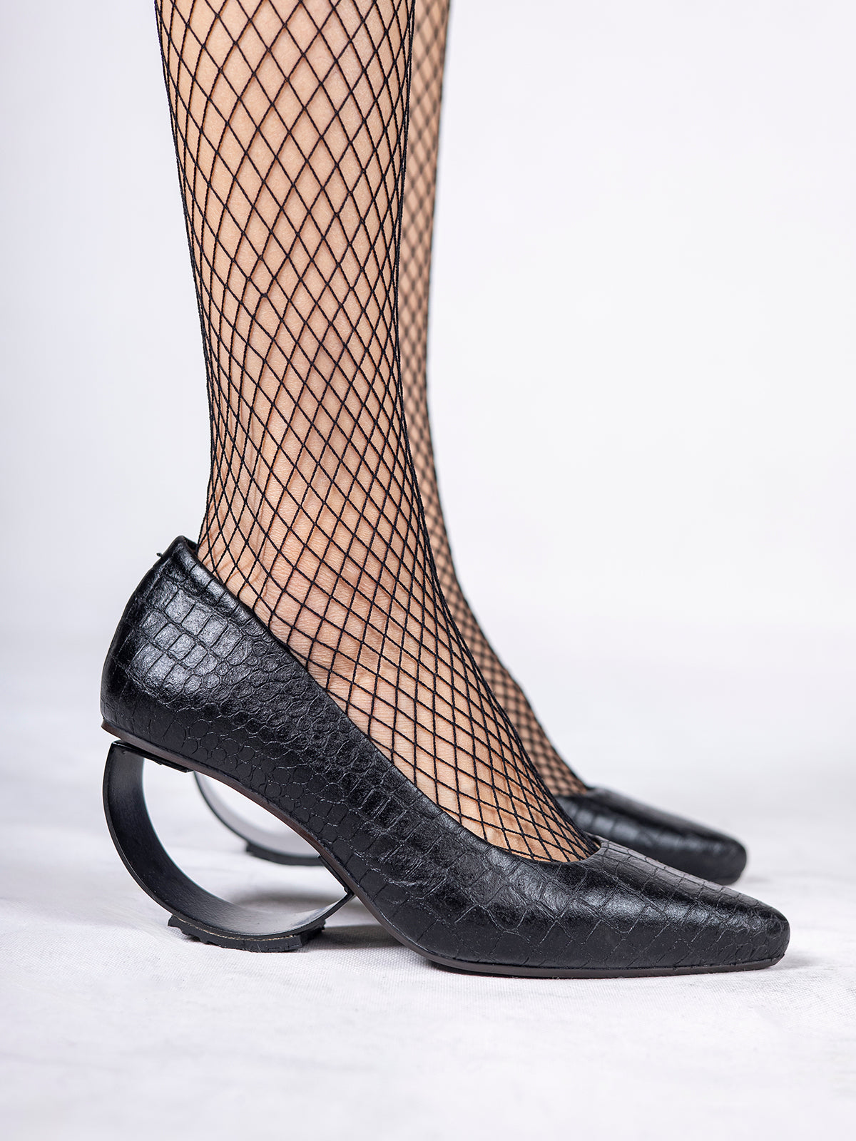 Embossed Black Plant Leather & Steel Crescent Heel Pumps