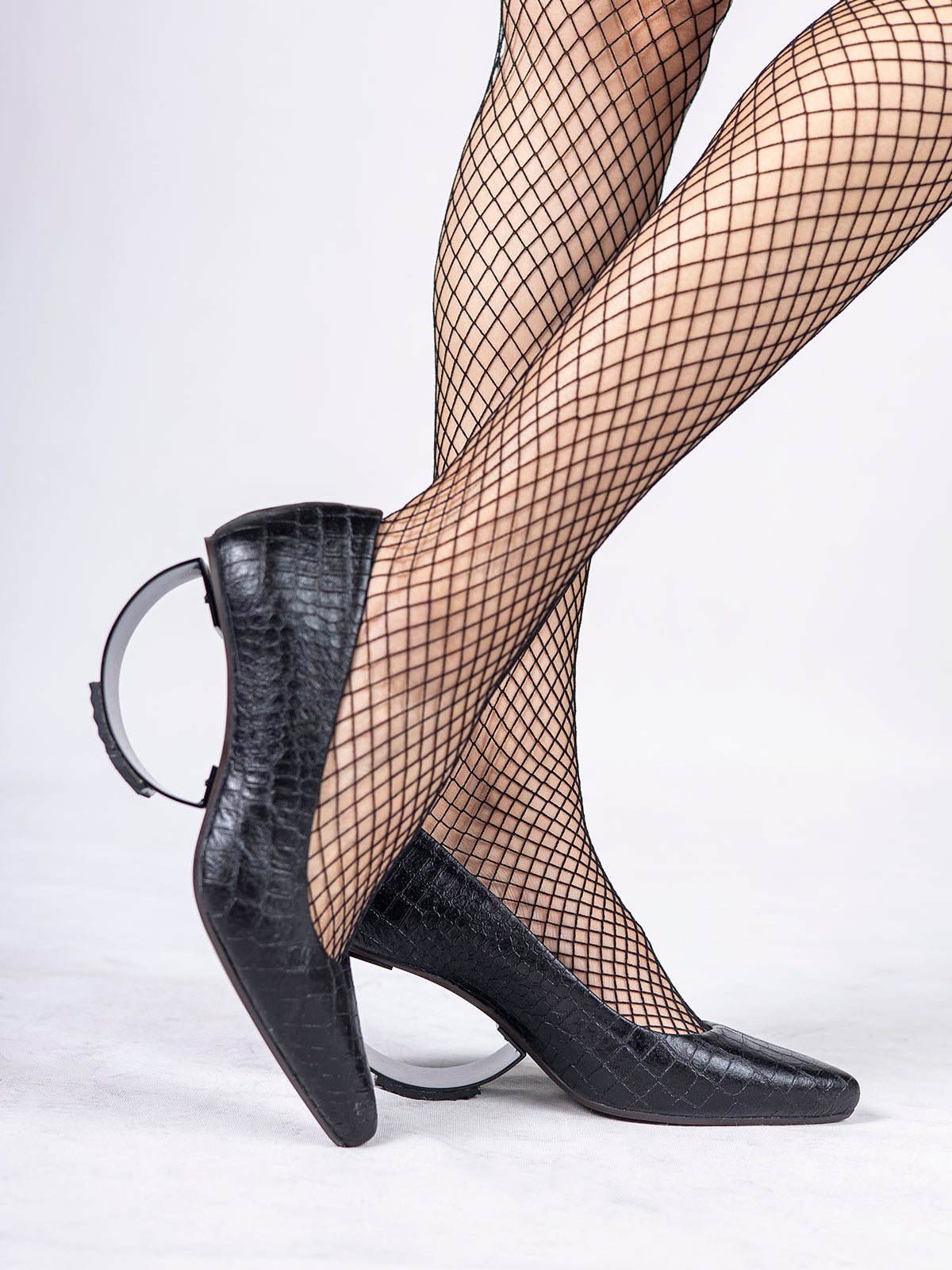 Embossed Black Plant Leather & Steel Crescent Heel Pumps