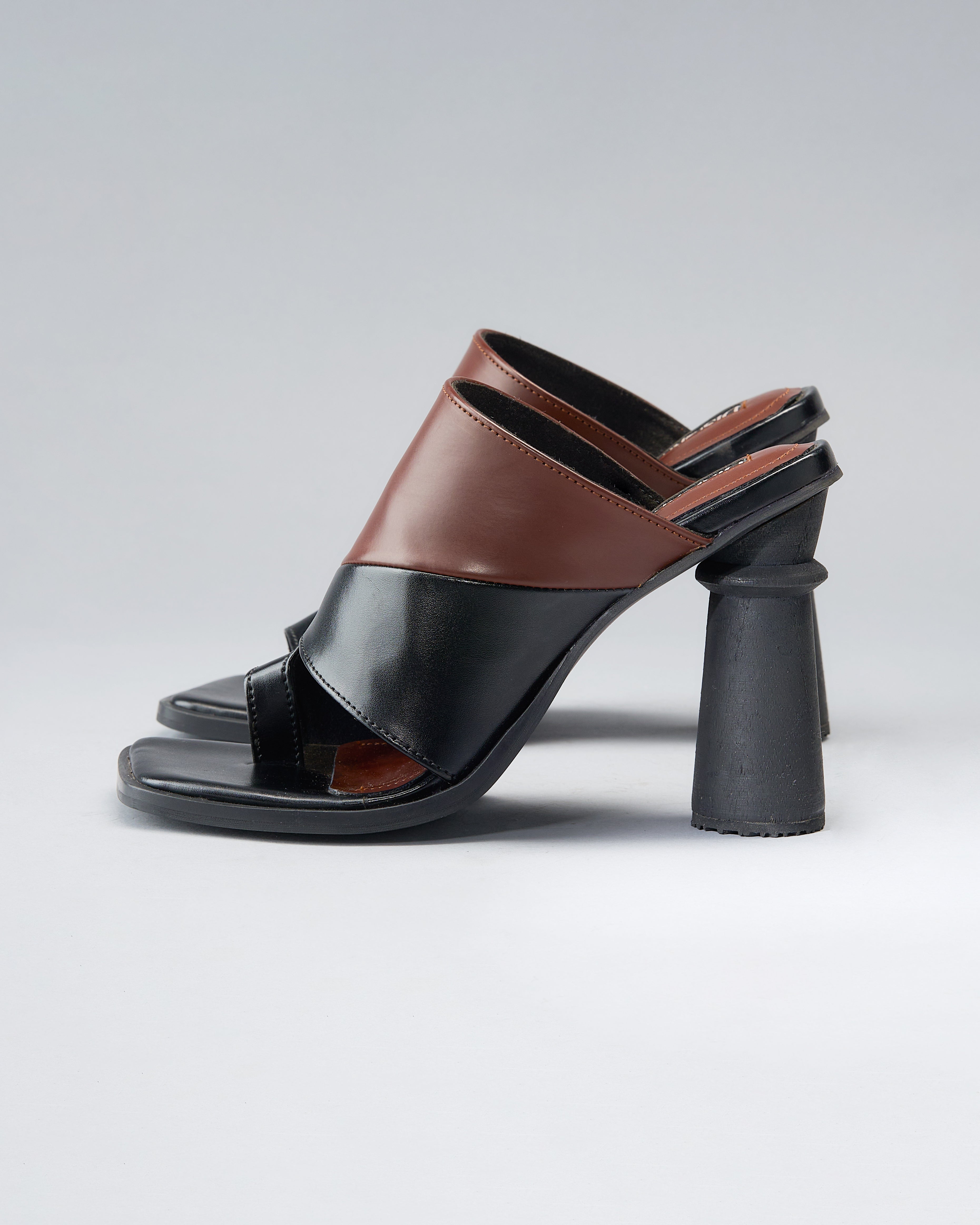 Sculptural, Open-Toe Mule with Graphic Contrast Upper and Architectural Heel.
