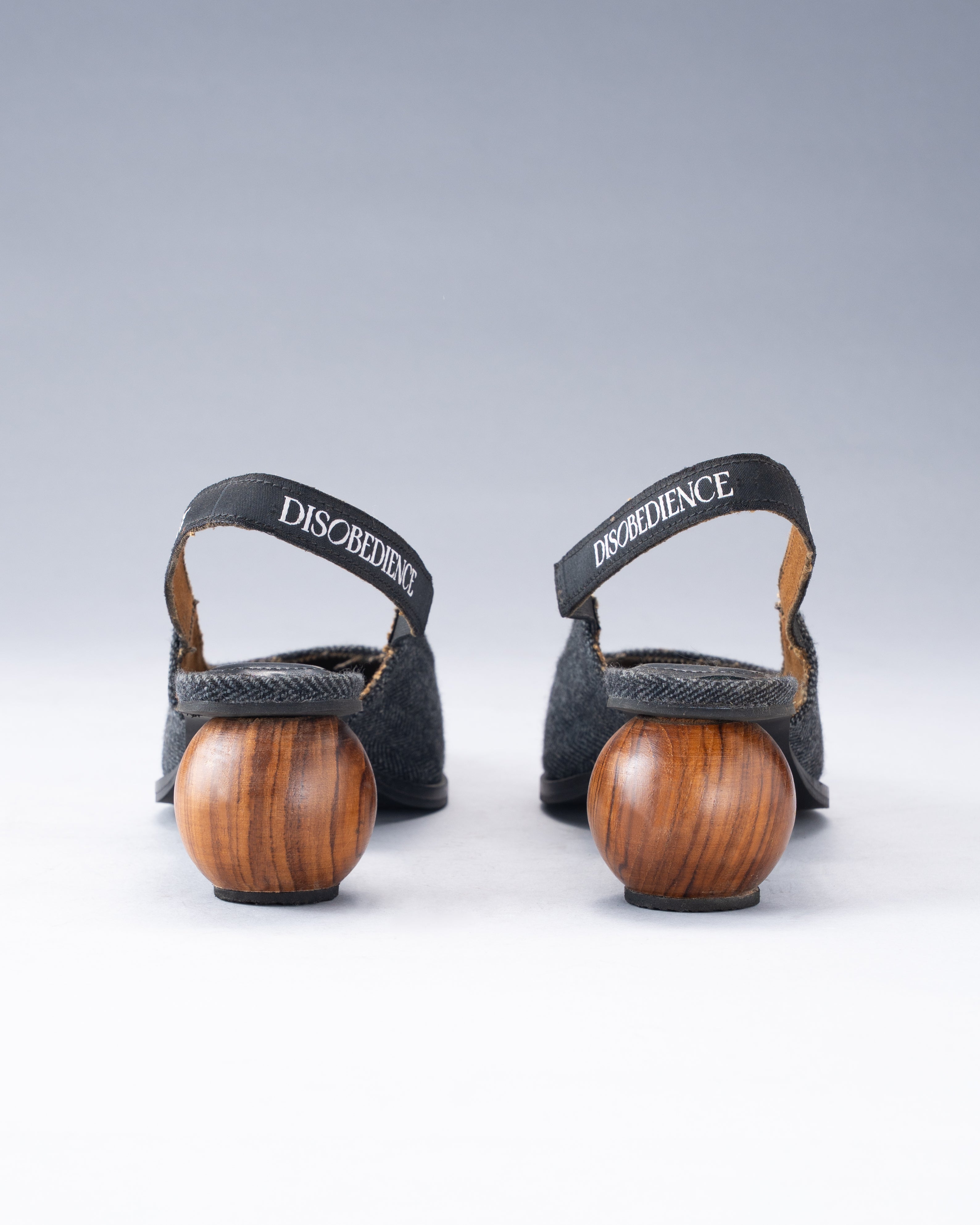 Wool-Blend Shoe Balanced on a Spherical Teak Heel