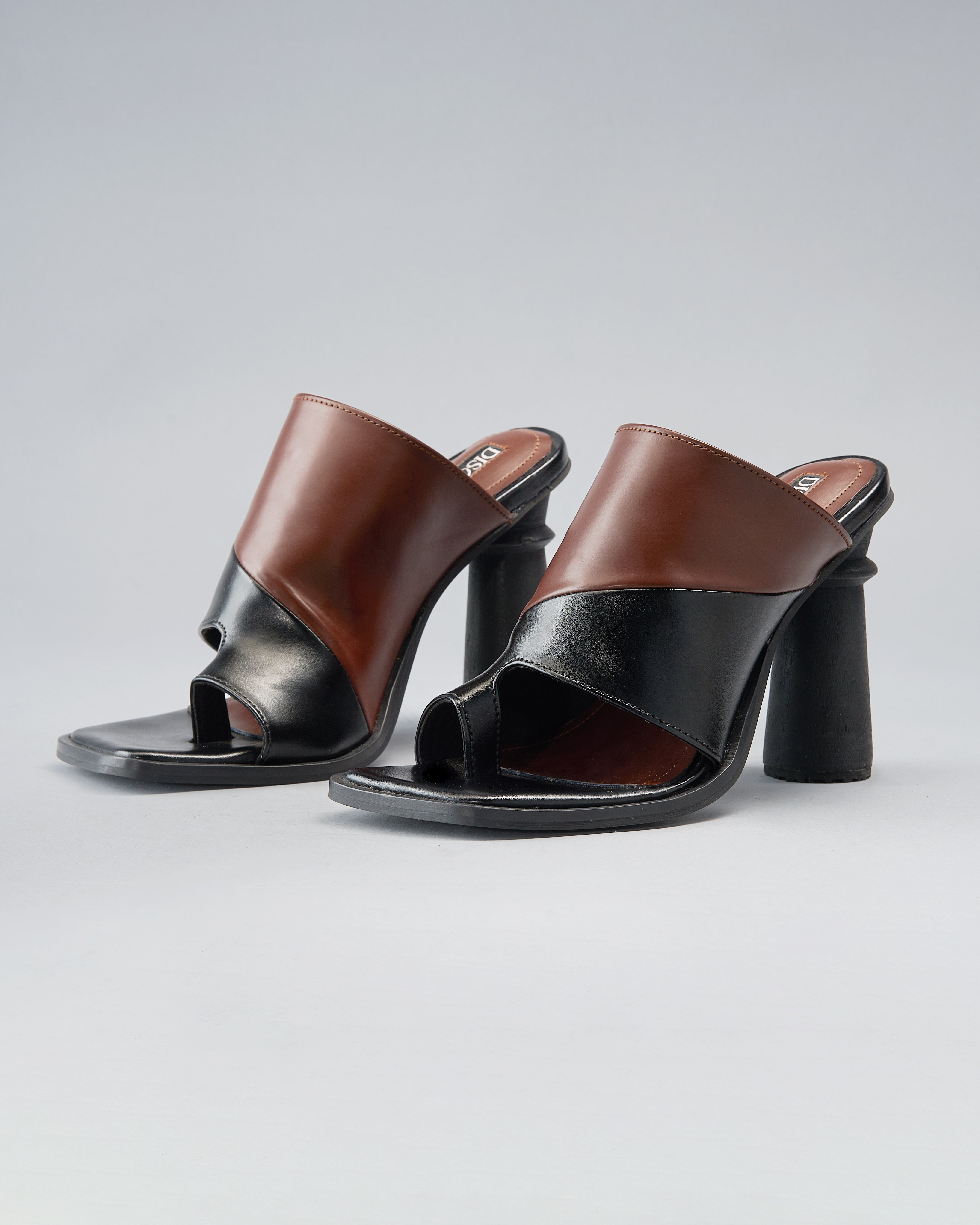 Sculptural, Open-Toe Mule with Graphic Contrast Upper and Architectural Heel.