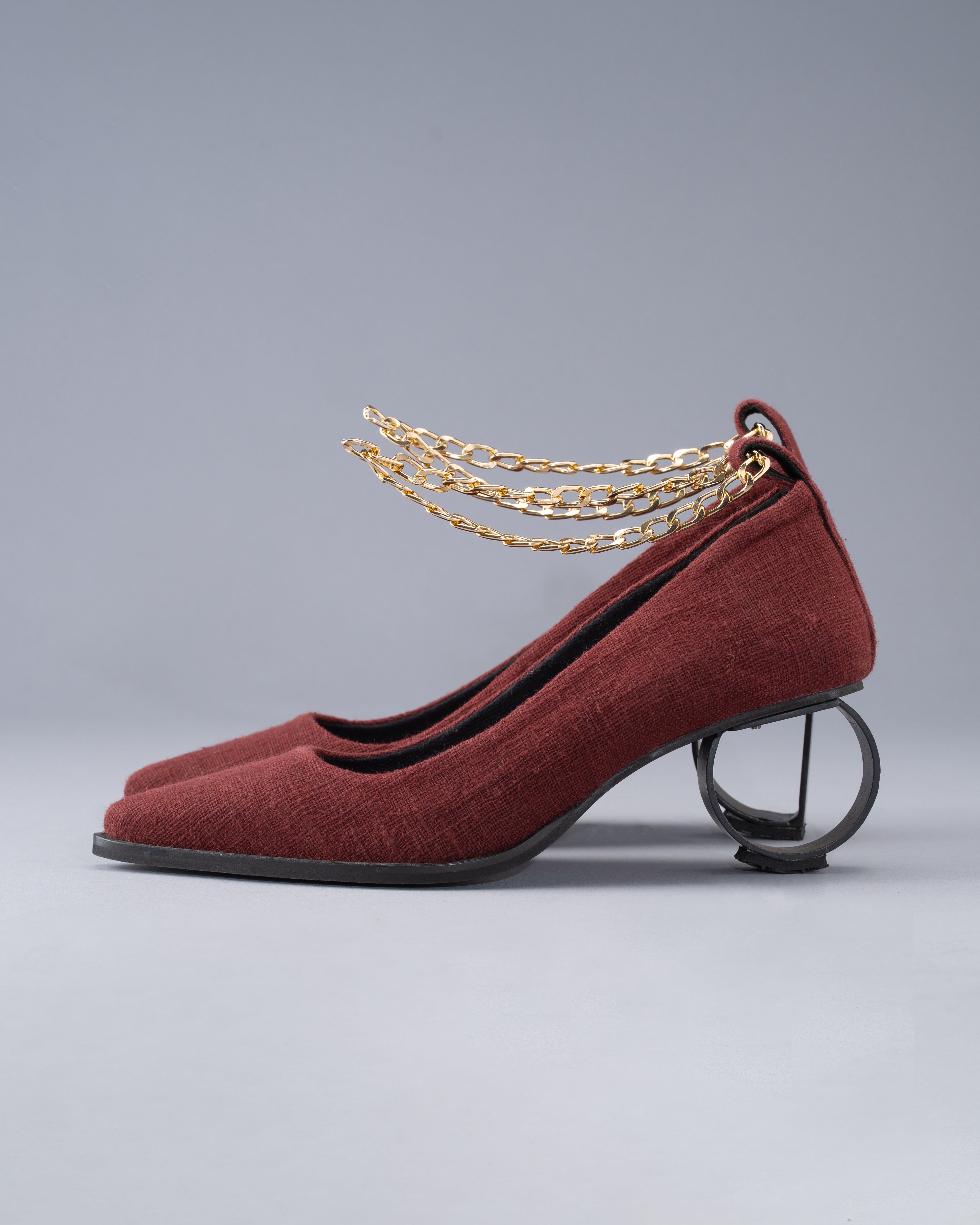 Sculptural Shoe  from Handwoven KalaCotton Grounded by a Signature D & O Heel and Secured with a Chain