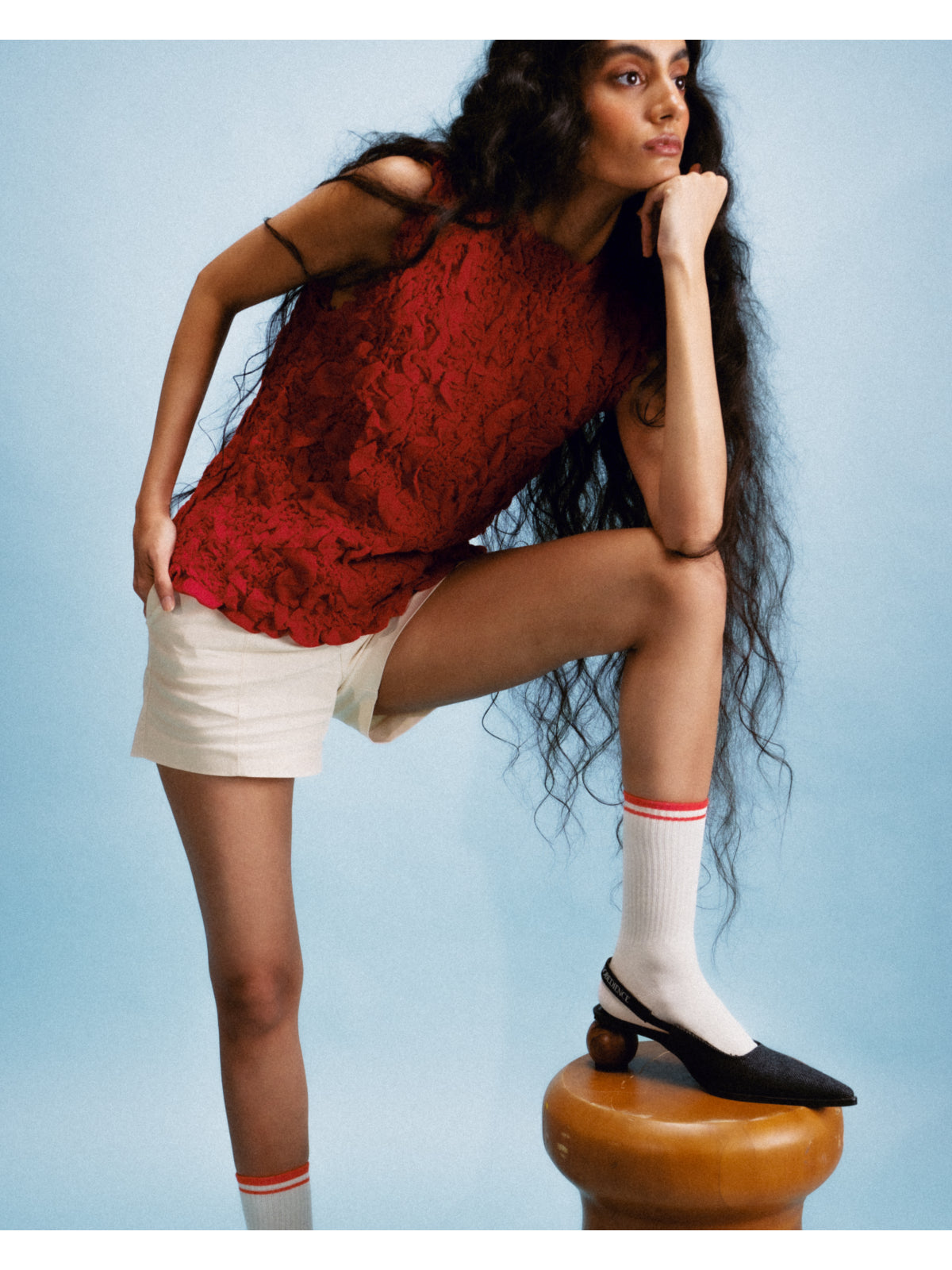 Sling-Back Sandal Balanced on a Spherical Teak Heel