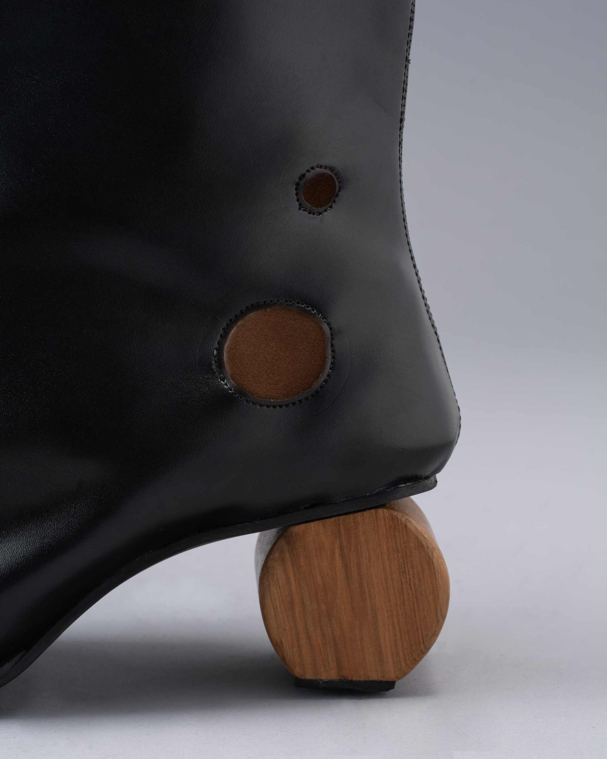 Pitch Black Boot with Laser Cutouts & Circular Wood Heel